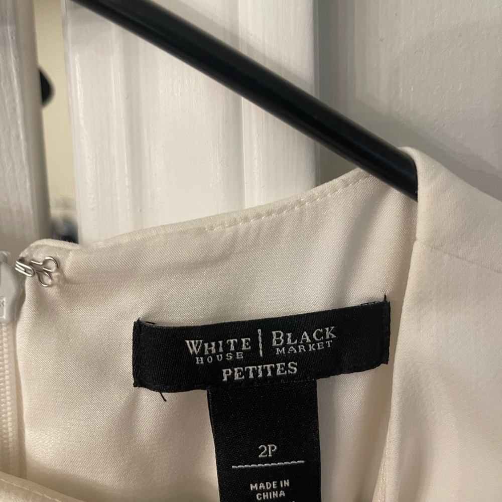 White House black market petite white peplum dress.
